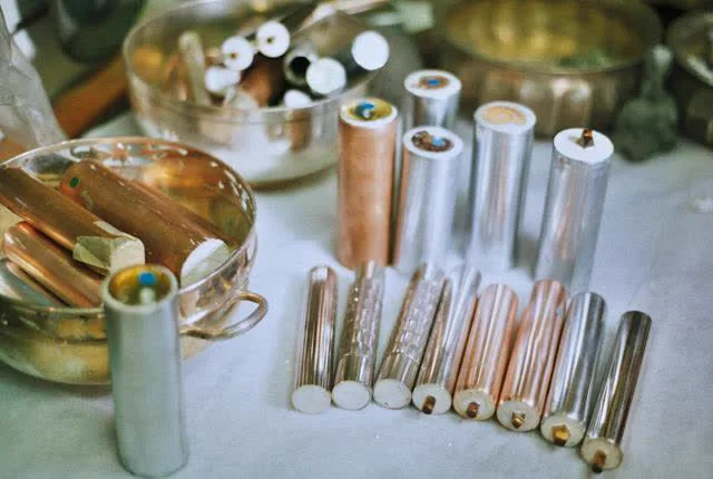 Rods in progress with gemstone-tipped ends